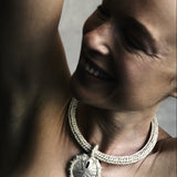 Hand crocheted choker necklace with bronze cast sand dollar pendant