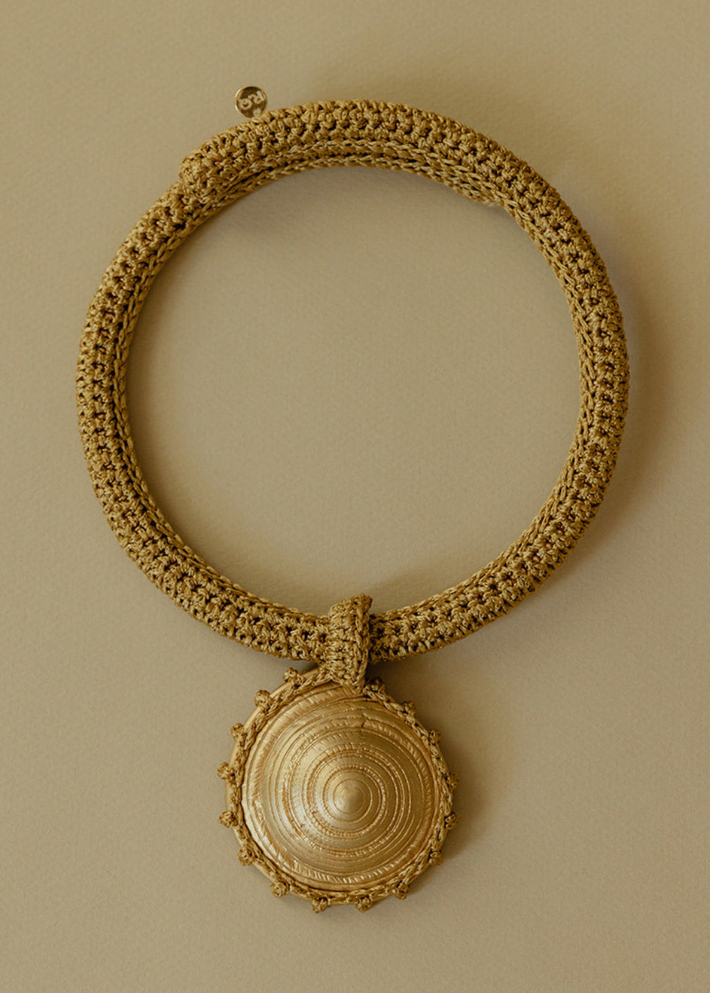 Gold hand crocheted chocker necklace with gold-plated bronze pendant