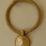 Gold hand crocheted chocker necklace with gold-plated bronze pendant