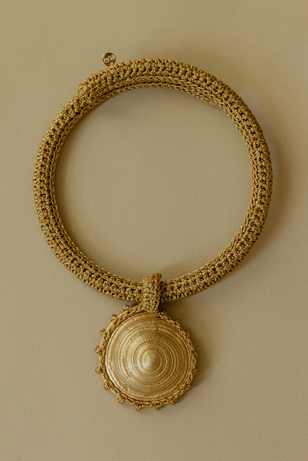 Gold hand crocheted chocker necklace with gold-plated bronze pendant