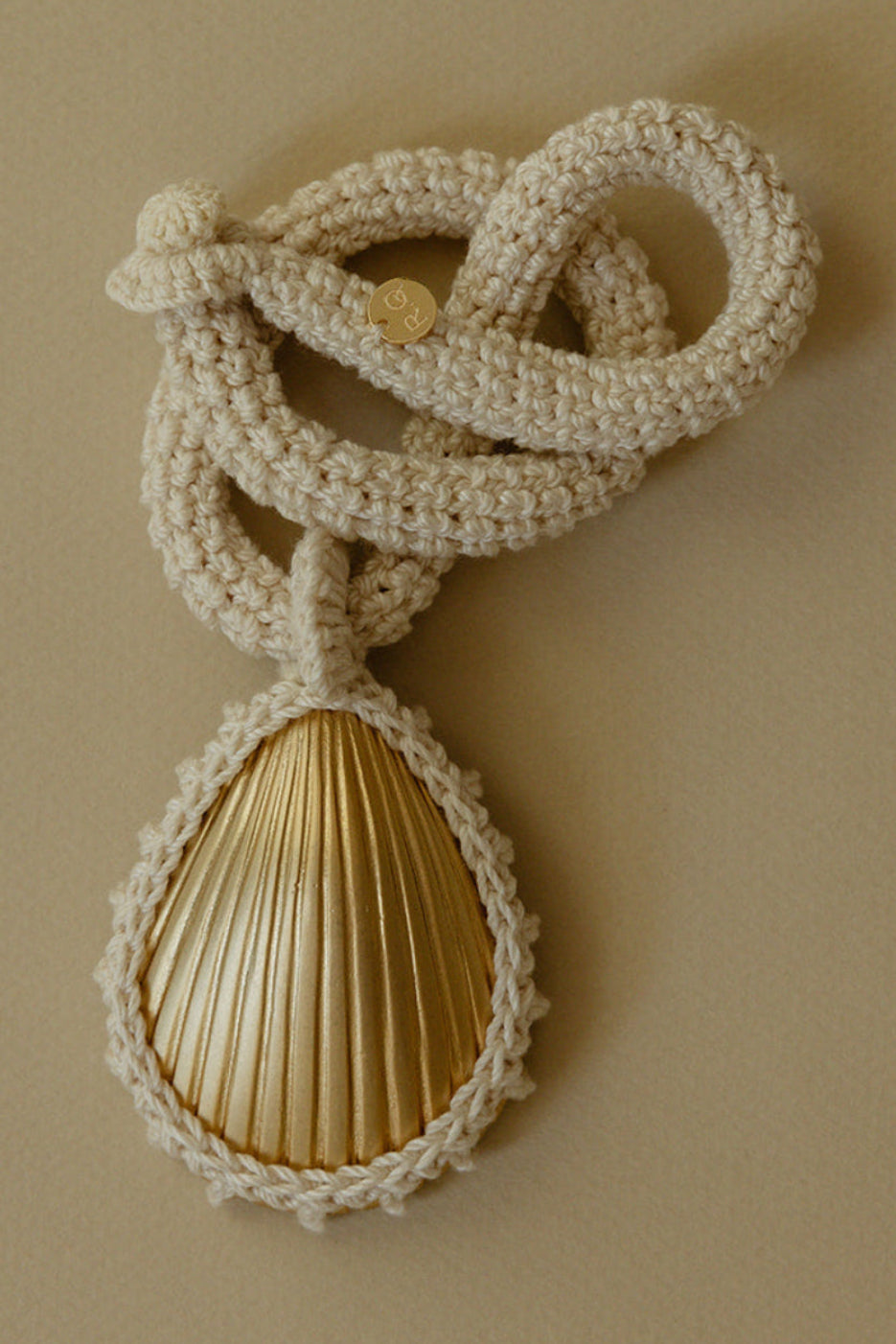 100% cotton hand crocheted necklace with gold-plated bronze seashell pendant