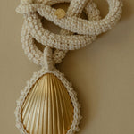 100% cotton hand crocheted necklace with gold-plated bronze seashell pendant